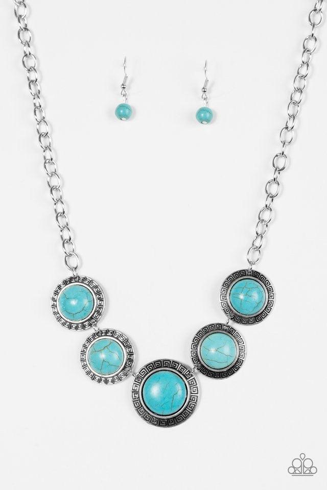 Paparazzi Accessories Mountain Roamer - Blue Chiseled into tranquil circles, smooth turquoise stones are pressed into ornate silver frames and linked below the collar for a tribal inspired look. Features an adjustable clasp closure. Sold as one individual