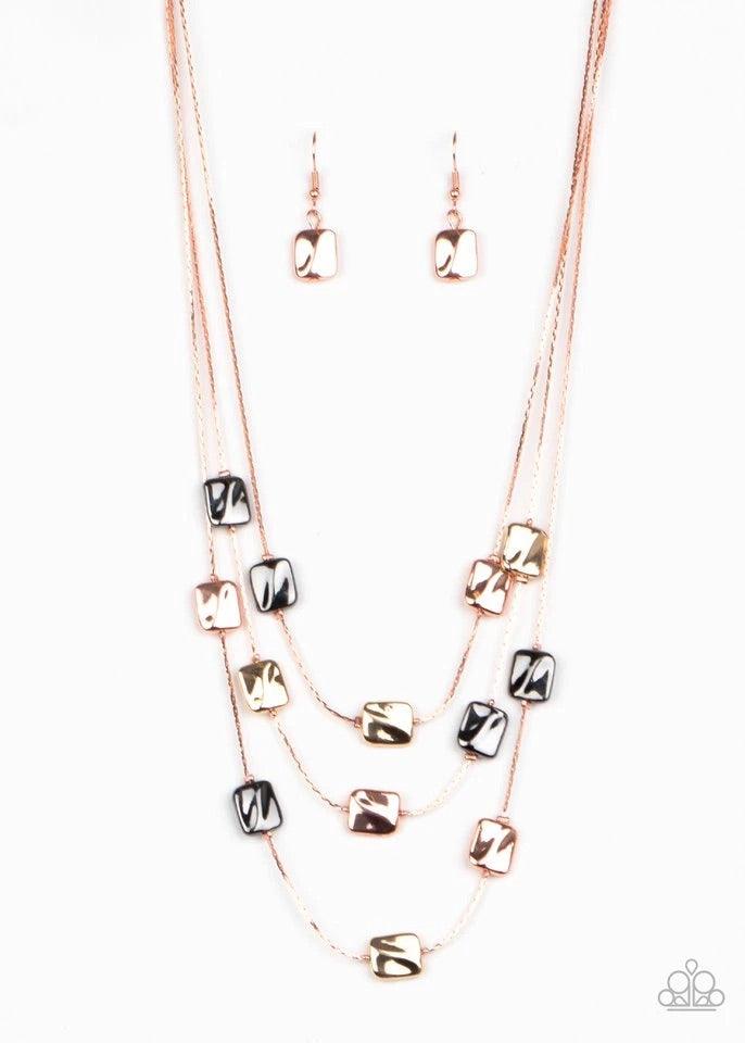 Paparazzi Accessories Downtown Reflections - Copper Featuring a decorative surface, dainty shiny copper, gunmetal, and gold rectangular accents are fitted in place along three sleek shiny copper chains, creating refined layers below the collar. Features a